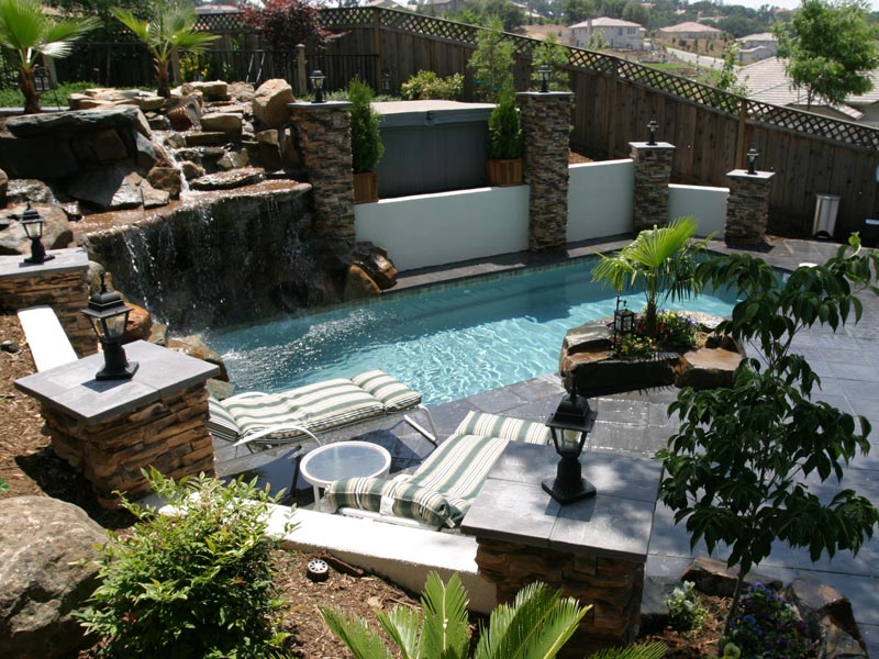 20 Awesome Landscaping Ideas For Your Backyard backyard-landscape-designs-with-pool - 20 Awesome Landscaping Ideas For Your Backyard