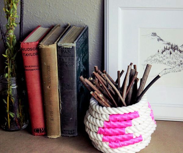 Fascinating-Home-Interior-Display-Including-DIY-Rope-Basket-for-Wood-Sticks-Completed-with-Books-Standing-Beside-Flower-Vase-on-Brown-Basement