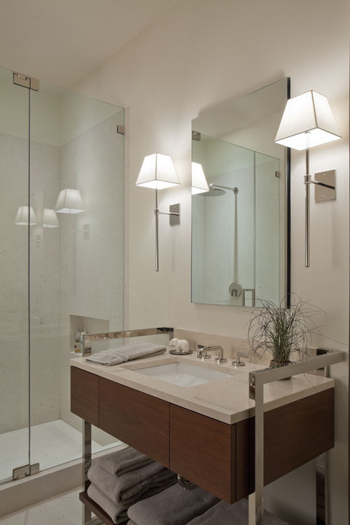 modern-bathroom-lighting-ideas-with-wall-sconces-in-both-sides-of-mirror